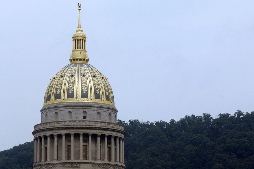 West Virginia's Capitol dome is shown Friday, Oct.1 4, 2005, in Charleston, W.Va. A termination letter from the former secretary for the troubled agency that ran West Virginia's foster care and substance use support services is public information, a state appeals court ruled this week in May 2024, siding with the television station that was denied the information via a records request. (AP Photo/Jeff Gentner, File)