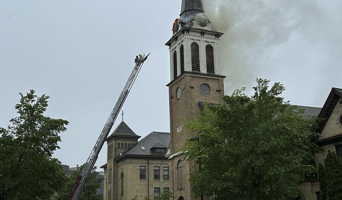 NextImg:Catholic church in downtown Madison catches fire following storms