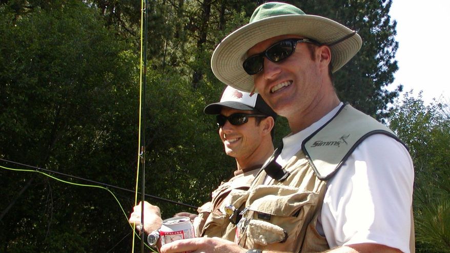 Sean Lake, left, and Glen Doherty pose on a fishing trip before Glen was killed while fighting during the U.S. Consulate attack in Benghazi, Libya on Sept. 12, 2012. Glen was denied death benefits until his best friend Sean took the fight to the CIA and was able to reverse policy. Photo Courtesy of Sean Lake.