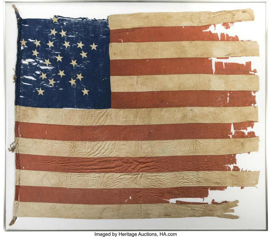 This image provided by Heritage Auctions, shows 21-star U.S. flag. Illinois state investigators are scrutinizing the purchase by the Abraham Lincoln Presidential Library and Museum of this 21-star U.S. flag reportedly from 1818-1819 at the time that Illinois was admitted to the Union as the 21st state. At the same time, one of the nation's top vexillologists, or flag experts, says the flag is not from 1818 but from the Civil War period and is likely a so-called Southern exclusionary flag, reserving on its blue canton space for stars representing only those states remaining loyal to the Union. (Heritage Auctions via AP)