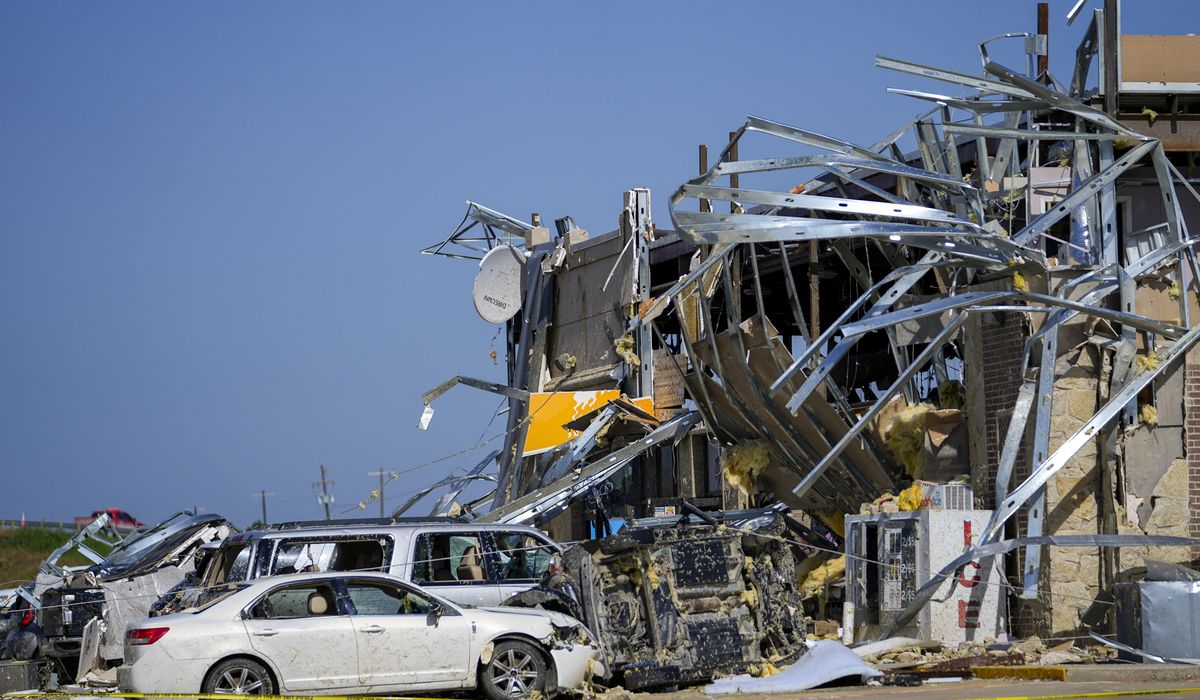 NextImg:Latest deadly weather in U.S. kills at least 18 as storms carve path of ruin across multiple states