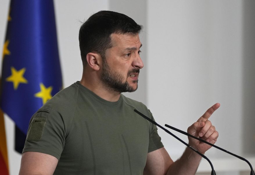 Ukrainian President Volodymyr Zelenskyy speaks during a joint news conference with Spain's Prime Minister Pedro Sanchez at the Moncloa Palace in Madrid, Spain, Monday, May 27, 2024. (AP Photo/Paul White)