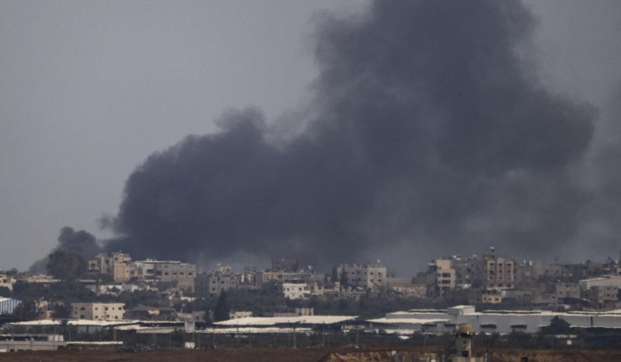 Smoke billows after an explosion in the Gaza Strip, as seen from southern Israel, Tuesday, May 28, 2024. (AP Photo/Leo Correa)
