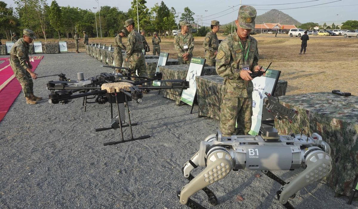 NextImg:Chinese military shows off rifle-mounted robot dogs at joint exercise with Cambodia