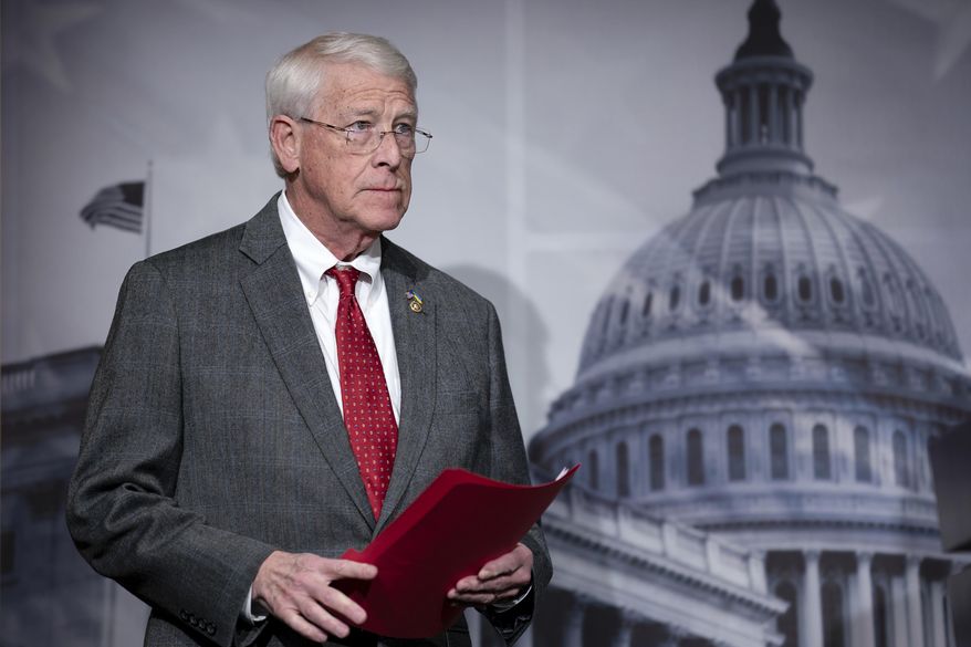 Senate Armed Services Committee Ranking Member Roger Wicker, R-Miss., meets with reporters during a news conference at the Capitol in Washington, Jan. 11, 2024. The top Republican on a Senate committee that oversees the U.S. military is making an argument for aggressively increasing defense spending over negotiated spending caps. Sen. Roger Wicker, a Mississippi Republican, is releasing a plan for a “generational investment” that seeks to deter coordinated threats from U.S. adversaries like Russia, Iran and China. (AP Photo/J. Scott Applewhite) **FILE**
