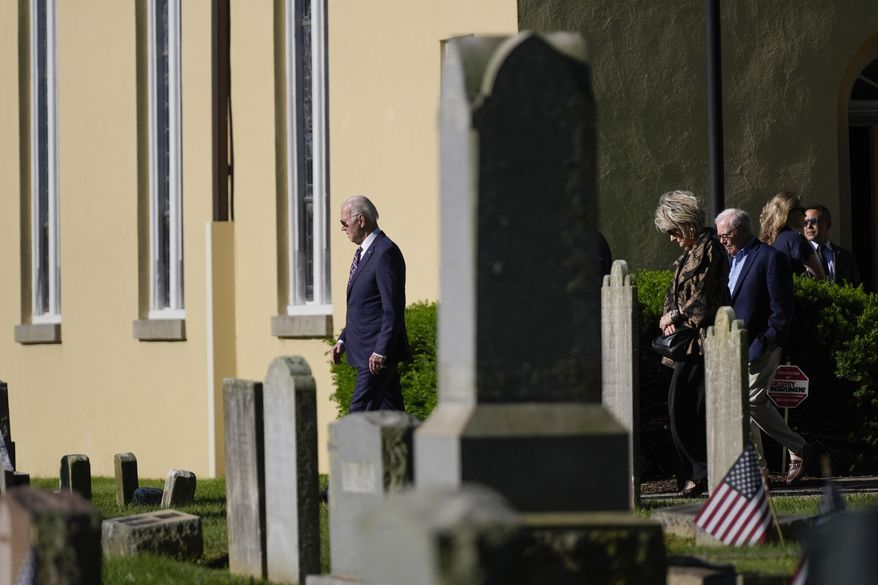 President Joe Biden walks to visit the gravesite of his late son Beau after attending a private ceremony to mark his passing at St. Joseph on the Brandywine Roman Catholic Church, Thursday, May 30, 2024, in Wilmington, Del. (AP Photo/Evan Vucci)