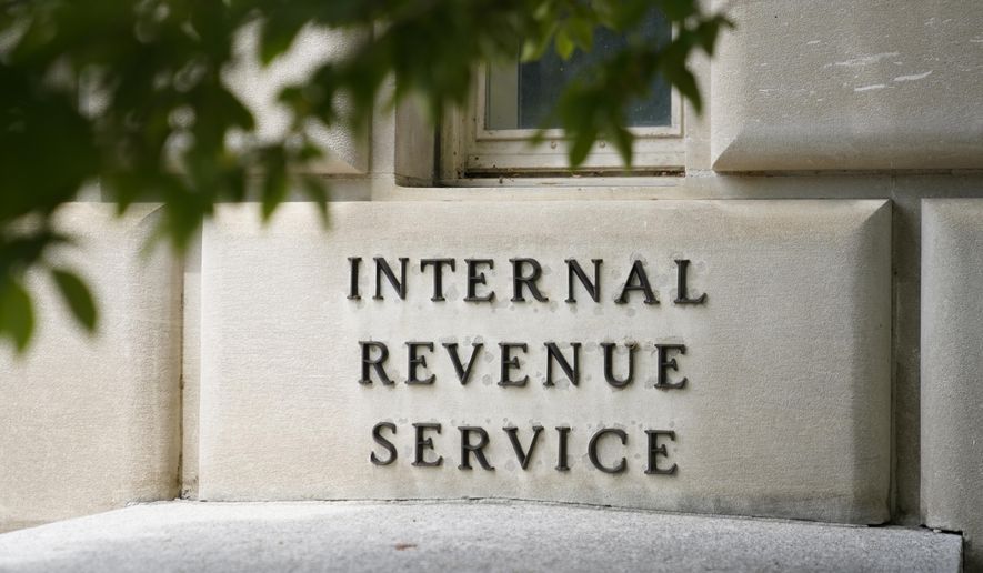 A sign outside the Internal Revenue Service building is seen, May 4, 2021, in Washington. (AP Photo/Patrick Semansky, File)
