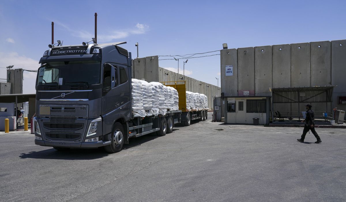 NextImg:Israel says daily ‘tactical pause’ at Gaza checkpoint to allow faster transfer of humanitarian aid