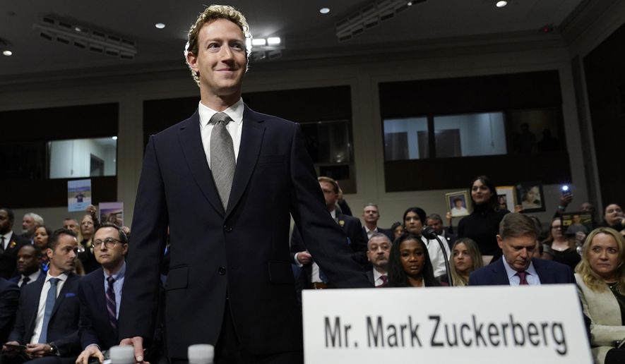 Meta CEO Mark Zuckerberg arrives to testify before a Senate Judiciary Committee hearing on Capitol Hill in Washington, Wednesday, Jan. 31, 2024. A New Mexico judge has granted Mark Zuckerberg's request to be dropped from a lawsuit that alleges his company has failed to protect young users from exposure to child sexual abuse material.(AP Photo/Susan Walsh, file)