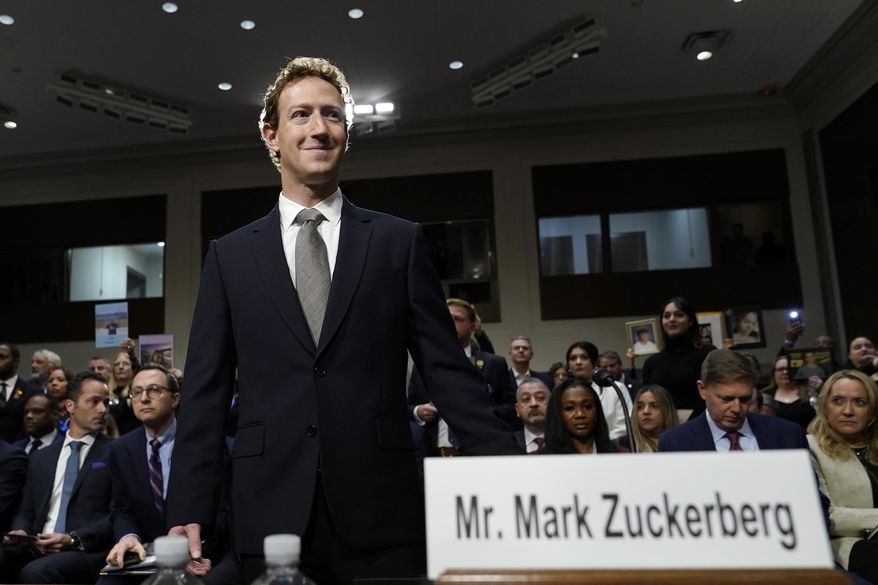Meta CEO Mark Zuckerberg arrives to testify before a Senate Judiciary Committee hearing on Capitol Hill in Washington, Wednesday, Jan. 31, 2024. A New Mexico judge has granted Mark Zuckerberg's request to be dropped from a lawsuit that alleges his company has failed to protect young users from exposure to child sexual abuse material.(AP Photo/Susan Walsh, file)