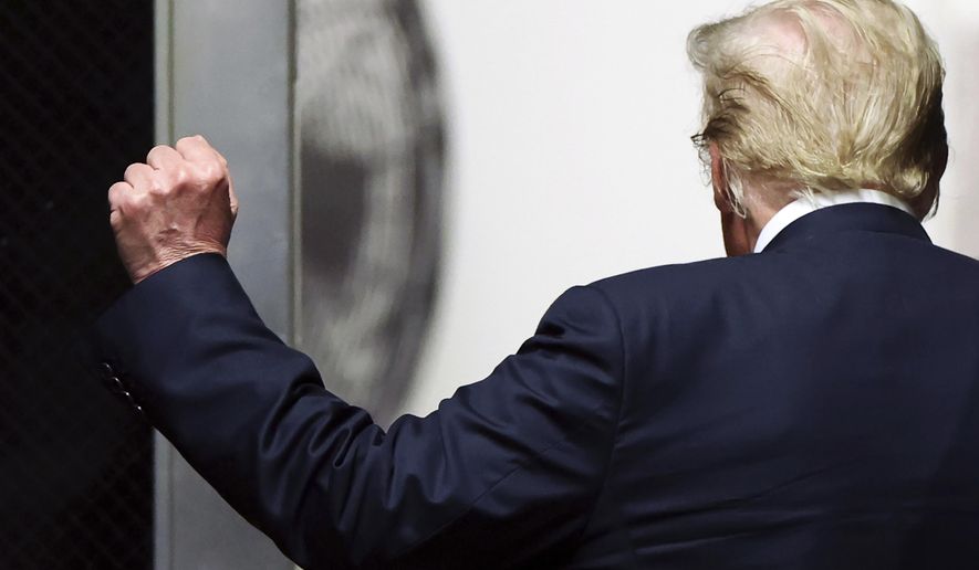 Former President Donald Trump walks to the courtroom at Manhattan criminal court as jurors are expected to begin deliberations in his criminal hush money trial in New York, on May 29, 2024. (Charly Triballeau/Pool Photo via AP)