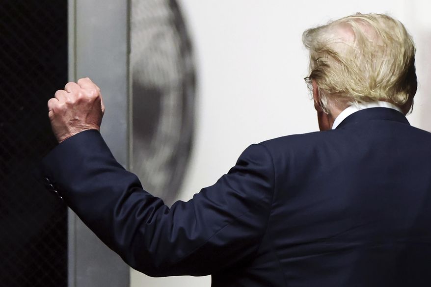 Former President Donald Trump walks to the courtroom at Manhattan criminal court as jurors are expected to begin deliberations in his criminal hush money trial in New York, on May 29, 2024. (Charly Triballeau/Pool Photo via AP)