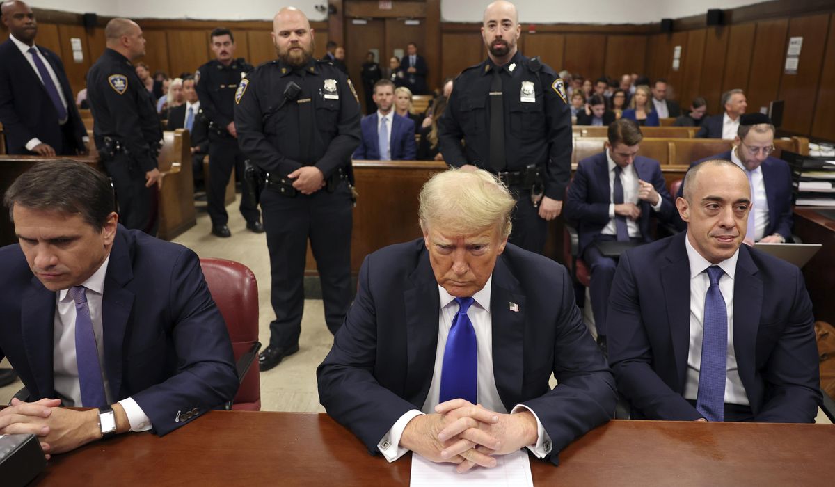 NextImg:Trump returns to court with son Eric: ‘Here we go again’