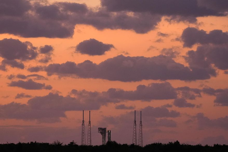 Boeing's Starliner capsule, atop an Atlas V rocket, sits on the launch pad during sunrise at Space Launch Complex 41 Saturday, June 1, 2024, in Cape Canaveral, Fla. NASA astronauts Butch Wilmore and Suni Williams will launch aboard the rocket to the International Space Station, scheduled for liftoff later Saturday. (AP Photo/Chris O'Meara)