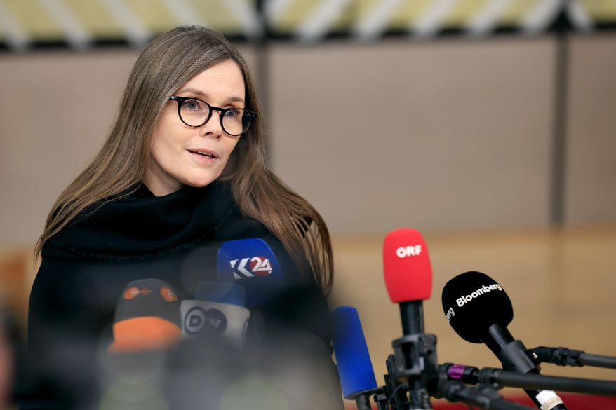 Iceland's Prime Minister Katrin Jakobsdottir speaks with the media as she arrives for an EU Summit in Brussels, on March 22, 2024. Voters in Iceland are choosing a president on Saturday, June 1, 2024 selecting from a field of 12 men and women, including former prime minister Jakobsdottir. Jakobsdottir resigned as prime minister earlier this year to run for president. (AP Photo/Geert Vanden Wijngaert, File)
