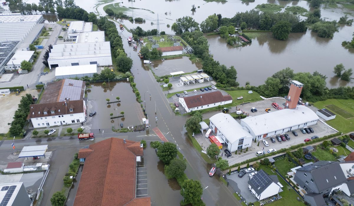 NextImg:A firefighter dies and a long-distance train derails amid heavy rains and flooding in Germany
