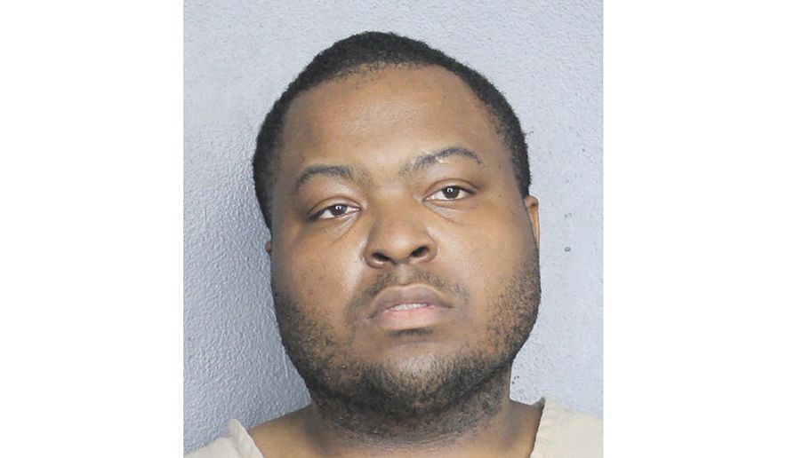 This booking photo provided by the Broward County, Fla., Sheriff's Office shows rapper and singer Sean Kingston, whose real name is Kisean Anderson. Kingston is back in South Florida, where he and his mother are charged with committing more than a million dollars worth of fraud. Jail records show 34-year-old Kingston was booked into the Broward County jail on Sunday, June 2, 2024. (Broward County Sheriff's Office via AP)