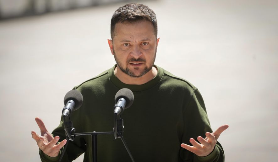 Ukrainian President Volodymyr Zelenskyy talks during a joint press conference with European Parliament President Roberta Metsola in Kyiv Ukraine, on May 9, 2024. Poland has eighteen people under arrest since December on allegations of pursuing hostile activity or planning sabotage in the country on Russia's and Belarus' bidding, including plans to assassinate Ukraine’s President Volodymyr Zelenskyy, the interior minister said Monday June 3, 2024. (AP Photo/Efrem Lukatsky, File)