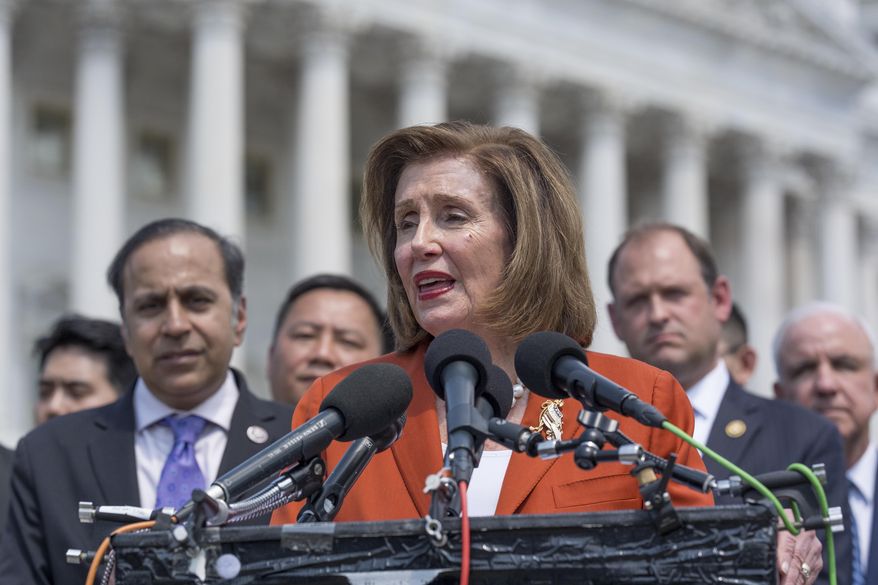 Rep. Nancy Pelosi, D-Calif., the speaker emerita, joins members of the House Select Committee on the Chinese Communist Party and other lawmakers at an event to commemorate the 35th anniversary of the bloody 1989 crackdown on pro-democracy protests in Tiananmen Square in Beijing, at the Capitol in Washington, Tuesday, June 4, 2024. (AP Photo/J. Scott Applewhite)