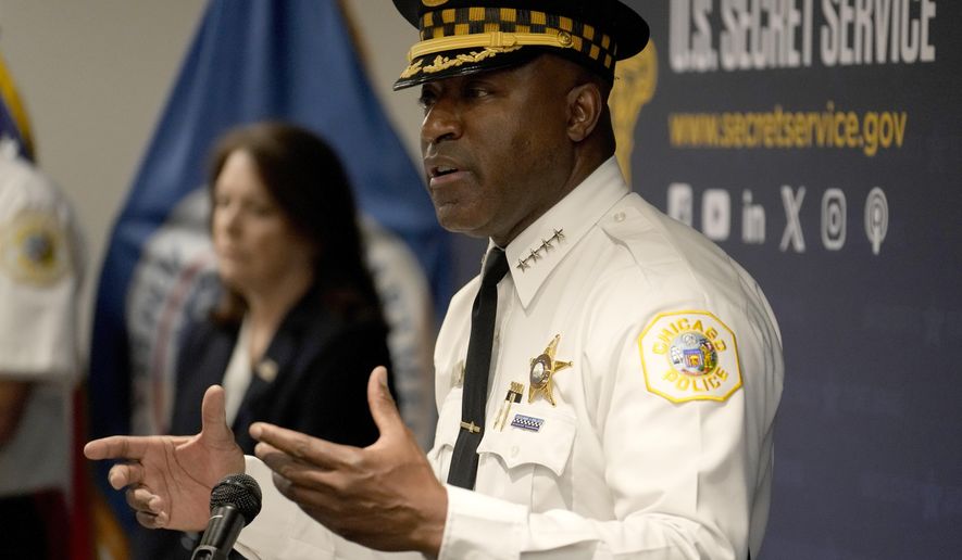 Chicago Police Superintendent Larry Snelling responds to a question as U.S. Secret Service Director Kimberly Cheatle, left, listens during a news conference about the upcoming Democratic National Convention on Tuesday, June 4, 2024, in Chicago. (AP Photo/Charles Rex Arbogast)