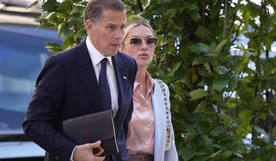 Hunter Biden, left, arrives with his wife, Melissa Cohen Biden at federal court, Tuesday, June 4, 2024, in Wilmington, Del. (AP Photo/Matt Slocum)