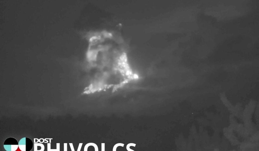 This grab taken from video footage recorded with a thermal camera on June 3, 2024, and provided by DOST-PHIVOLCS, shows the Kanlaon volcano erupting in Canlaon City, Negros, Philippines. (Joeal Calupitan/DOST-PHIVOLCS via AP)
