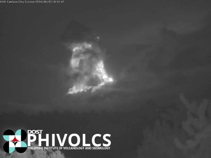 This grab taken from video footage recorded with a thermal camera on June 3, 2024, and provided by DOST-PHIVOLCS, shows the Kanlaon volcano erupting in Canlaon City, Negros, Philippines. (Joeal Calupitan/DOST-PHIVOLCS via AP)