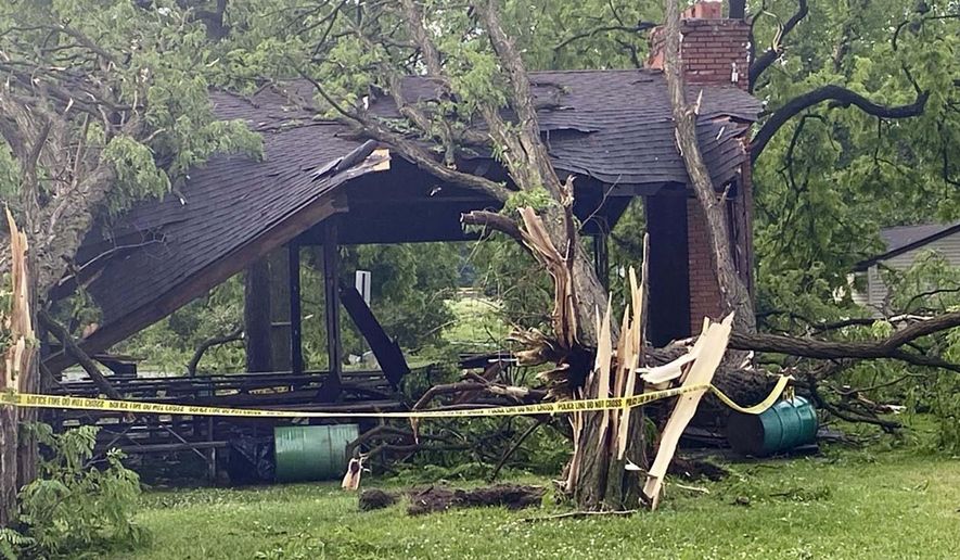 Several trees slammed into a structure at Rotary Park in Livonia, MIch., Wednesday, June 5, 2024 as a tornado tore through the western Wayne County community. (Nolan Finley/The Detroit News via AP)