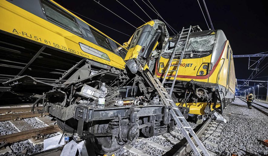 This photo released by Fire Department of Pardubice region shows a collided train in Pardubice, Czech Republic Thursday, June 6, 2024. A passenger train collided head-on with a freight train in the Czech Republic, killing and injuring some people, officials said early Thursday. (Fire Department of Pardubice region via AP)