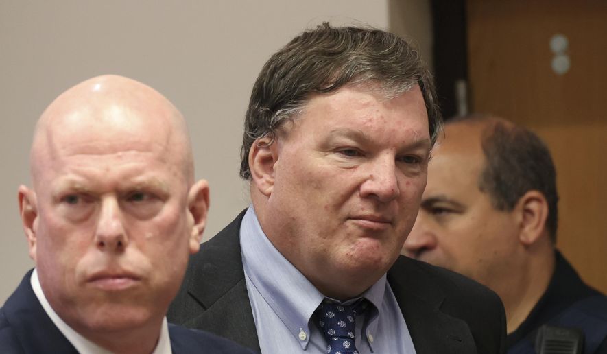 Rex Heuermann, center, charged in the Gilgo Beach serial killings on Long Island, appears for a hearing at Suffolk County Court in Riverhead, N.Y., Thursday, June. 6, 2024. Heuermann was charged Thursday in the deaths of two more, after prosecutors said they gathered new DNA evidence and found a computer document he had used to “blueprint” his crimes. (James Carbone/Newsday via AP, Pool)