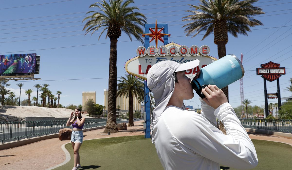 NextImg:Scorching heat keeps grip on Southwest U.S. as records tumble and more triple digits forecast