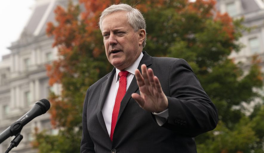 White House former chief of staff Mark Meadows speaks with reporters at the White House, Wednesday, Oct. 21, 2020, in Washington. Meadows appeared by videoconference, Friday, June 7, 2024, in Phoenix, pleading not guilty to nine felony charges stemming from their roles in an effort to overturn Trump's election loss in Arizona to Joe Biden. (AP Photo/Alex Brandon, File)