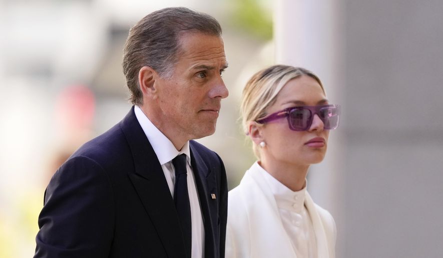 Hunter Biden, left, arrives to federal court with his wife, Melissa Cohen Biden, Friday, June 7, 2024, in Wilmington, Del. (AP Photo/Matt Slocum)