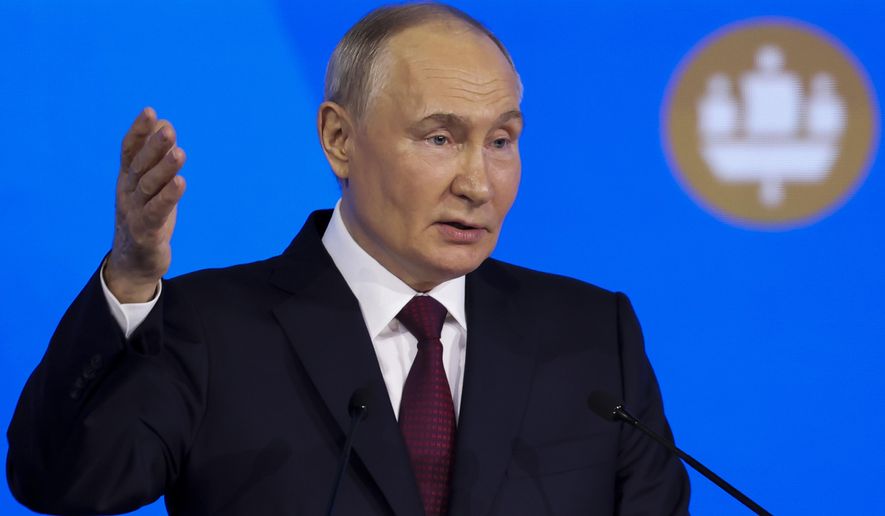 Russian President Vladimir Putin addresses a plenary session of the St. Petersburg International Economic Forum in St. Petersburg, Russia, on Friday, June 7, 2024. (Anton Vaganov/Pool Photo via AP)