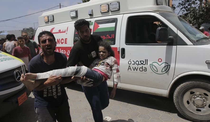 Palestinians wounded in the Israeli bombardment of the Gaza Strip arrive at al-Aqsa Hospital in Deir al Balah on Saturday, June 8, 2024. (AP Photo/Jehad Alshrafi)