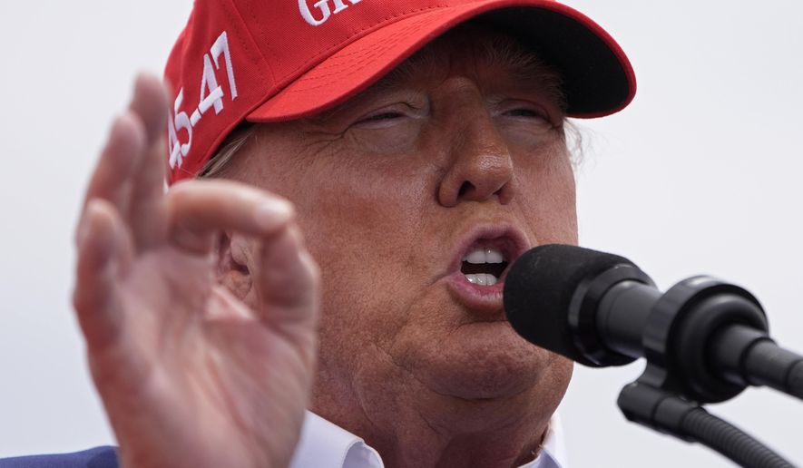 Republican presidential candidate, former President Donald Trump speaks at a campaign rally Sunday, June 9, 2024, in Las Vegas. (AP Photo/John Locher)