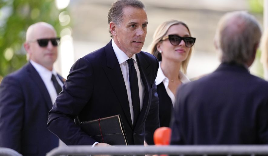 Hunter Biden arrives to federal court with his wife, Melissa Cohen Biden, Monday, June 10, 2024, in Wilmington, Del. (AP Photo/Matt Slocum)