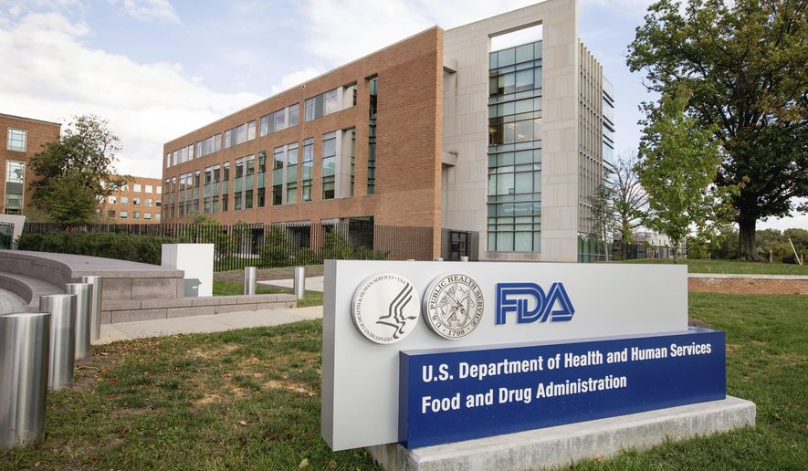 FILE - This Oct. 14, 2015, file photo, shows the U.S. Food & Drug Administration campus in Silver Spring, Md. Federal health regulators and law enforcement officials on Monday, June 10, 2024 vowed to work more closely to stop sales of illegal electronic cigarettes, which have grown into a multibillion-dollar business in the U.S. while skirting government oversight. (AP Photo/Andrew Harnik, File)