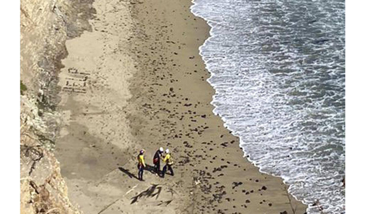 NextImg:Stranded surfer rescued from California beach after spelling out ‘HELP’