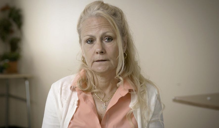 In a image taken from May 1, 2024 video, provided by Hard Working Movies, Pamela Smart makes a statement at Bedford Hills Correctional Facility in Bedford Hills, N.Y. Smart, who is serving life in prison for plotting with her teenage student to have her husband killed in 1990, accepted full responsibility for his death for the first time in a videotaped statement released Tuesday, June 11, 2024, as part of her latest sentence reduction request. (Hard Working Movies via AP)