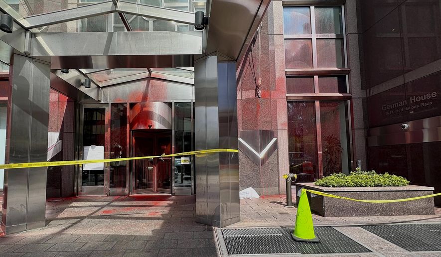 Red paint covers portions of the entrance to the German consulate building, Wednesday, June 12, 2024, in New York. Pro-Palestinian protesters have vandalized locations associated with the Brooklyn Museum and United Nations in New York City, throwing red paint across their entrances in opposition to the ongoing war between Israel and Hamas in Gaza. (AP Photo/Sophie Rosenbaum)
