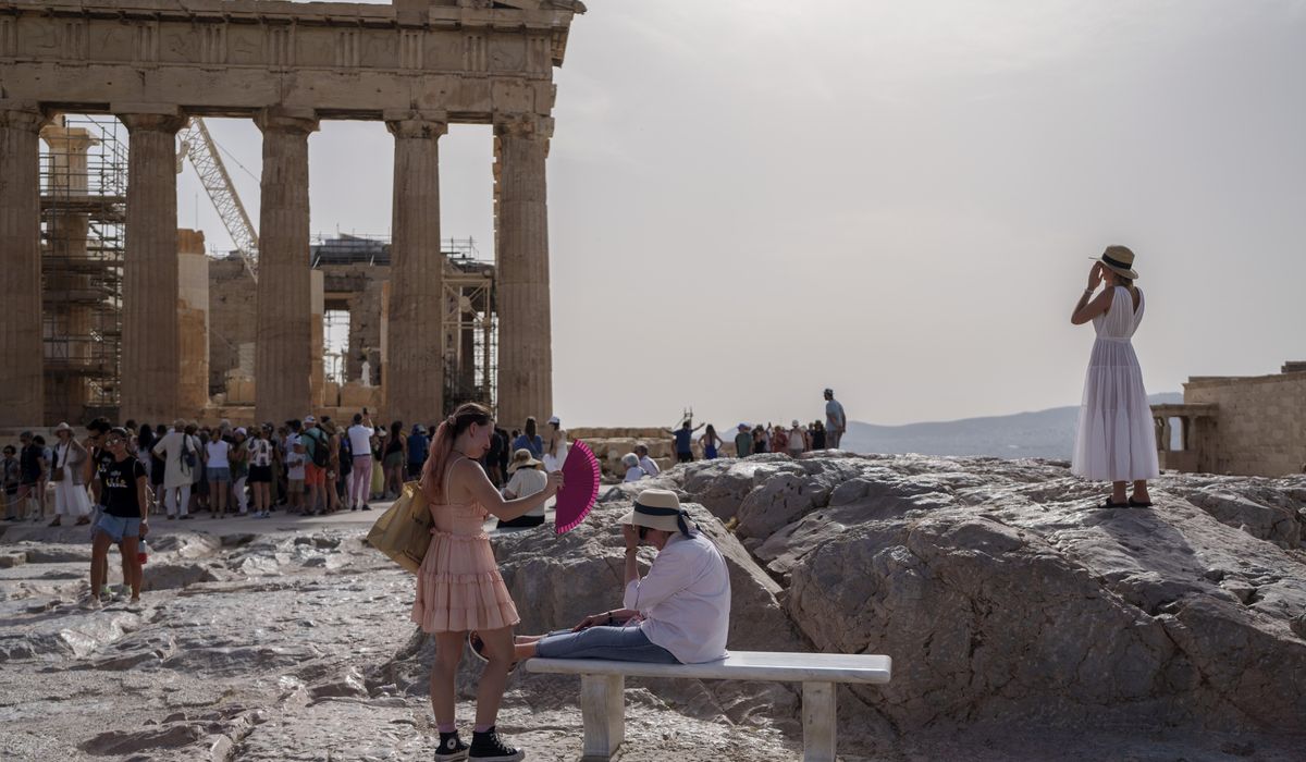 NextImg:Heat forces Greek authorities to shut down Acropolis during afternoon hours for a second day running
