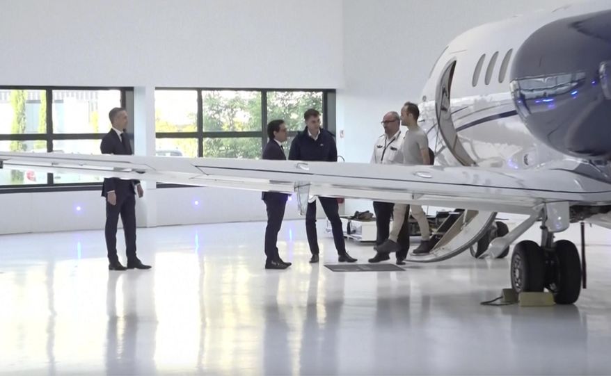 In this grab taken from video, Louis Arnaud disembarks a plane at Paris-Le-Bourget airport, in France, Thursday, June 13, 2024. French national Louis Arnaud arrived in France after being released by Iran where he was imprisoned for over 20 months for allegedly taking part in nationwide protests. Arnaud was greeted at Paris-Le-Bourget airport by his family and France’s foreign affairs minister. (Pool via AP)