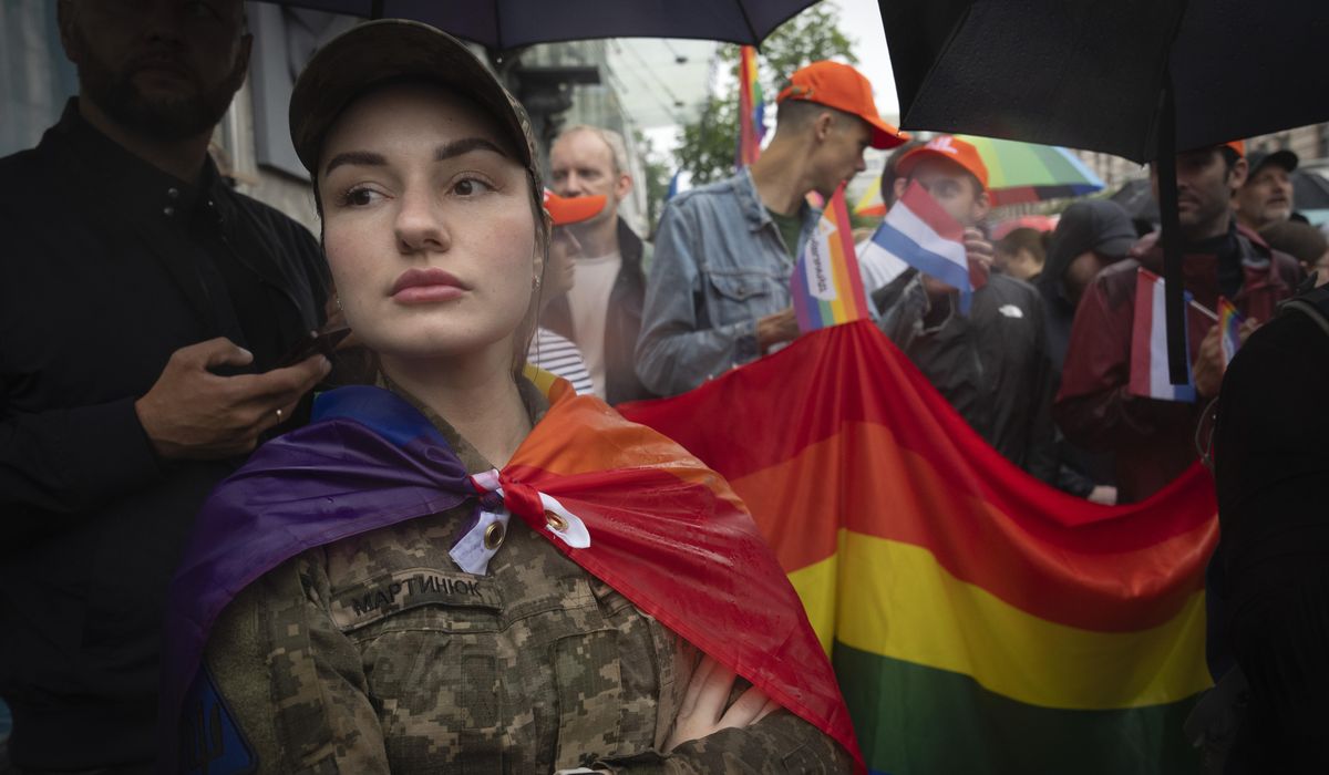 NextImg:LGBTQ soldiers in Ukraine hope their service is changing attitudes as they rally for legal rights