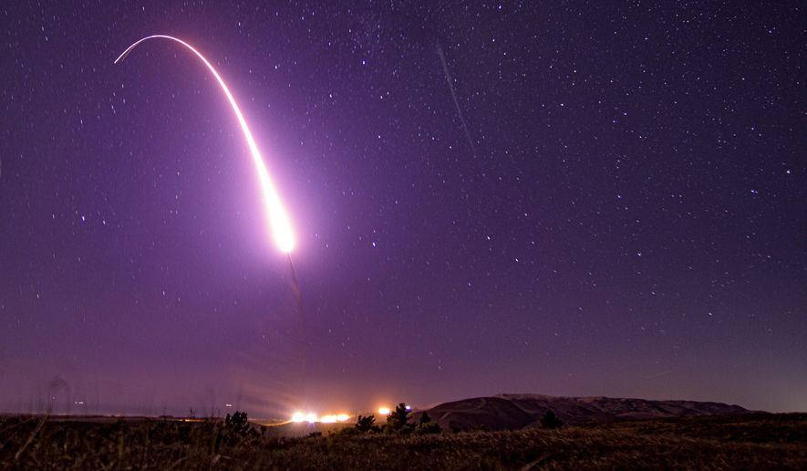 This image taken with a slow shutter speed on Oct. 2, 2019, and provided by the U.S. Air Force shows an unarmed Minuteman 3 intercontinental ballistic missile test launch at Vandenberg Air Force Base, Calif. The world's nine nuclear-armed states continue to modernize their nuclear weapons as the countries continue to deepen their reliance on such deterrence in 2023, a Swedish think tank said Monday, June 17, 2024. (Staff Sgt. J.T. Armstrong/U.S. Air Force via AP, File)