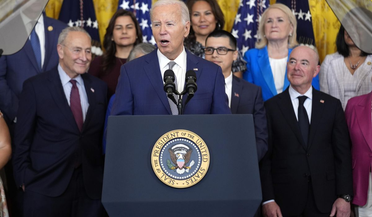NextImg:Biden hails new citizenship by marriage deal as a way to keep families together