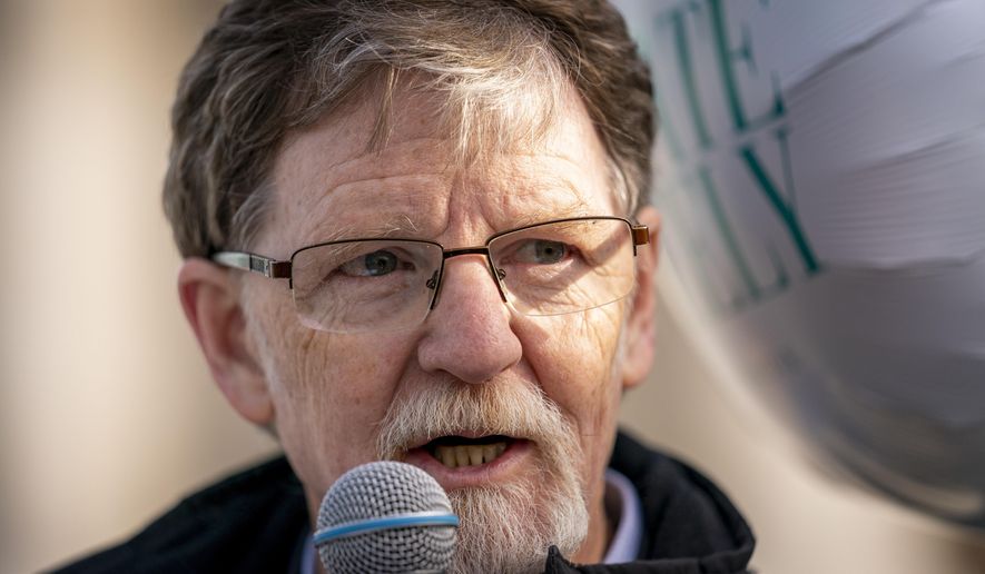Jack Phillips, who's case was heard by the U.S. Supreme Court five years ago after he objected to designing a wedding cake for a gay couple, speaks to supporters outside the Supreme Court in Washington, Dec. 5, 2022. The Colorado Supreme Court will hear arguments Tuesday, June 18, 2024, in a lawsuit against Phillips, the Christian baker who refused to make a cake celebrating a gender transition, one of three such cases from the state that have involved LGBTQ+ civil rights and First Amendment rights. Two cases have centered Phillips. (AP Photo/Andrew Harnik, File)