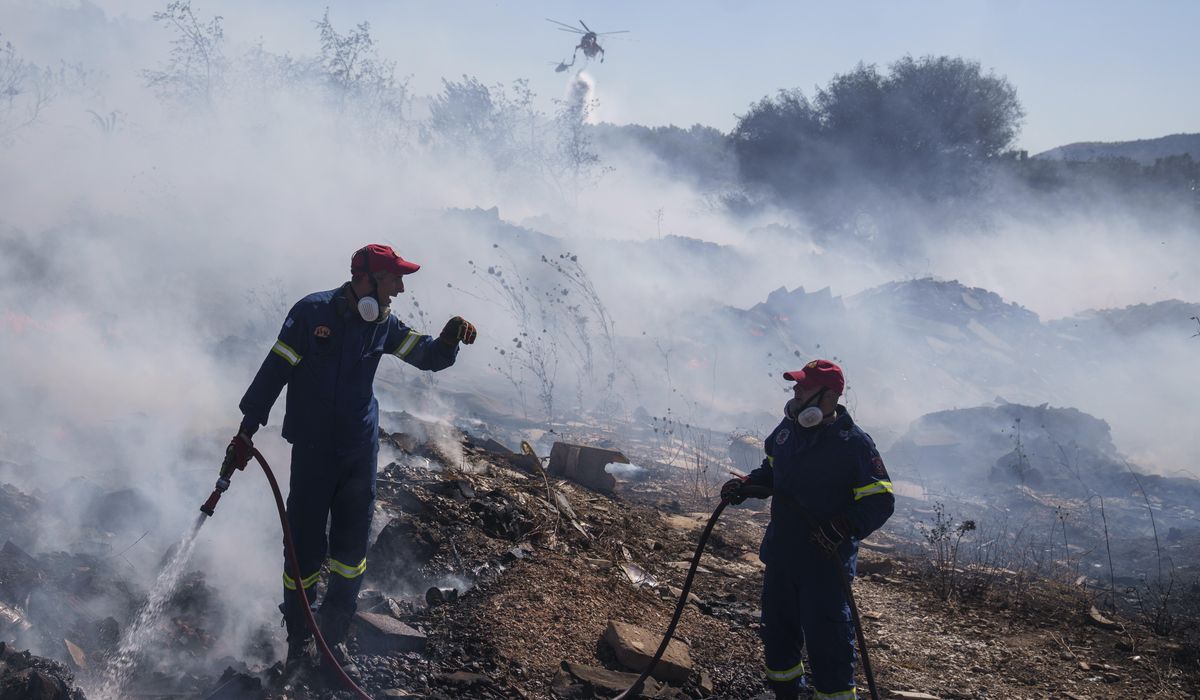 NextImg:A wildfire on the fringes of the Greek capital triggers evacuation alerts