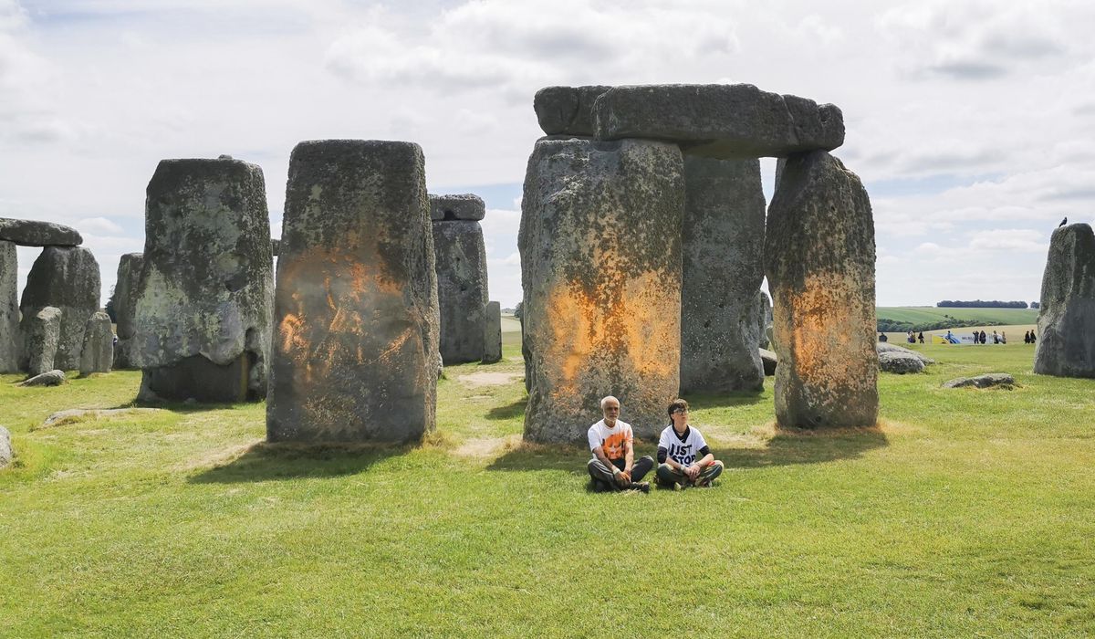 NextImg:Climate protesters arrested over spraying orange paint over Stonehenge monument