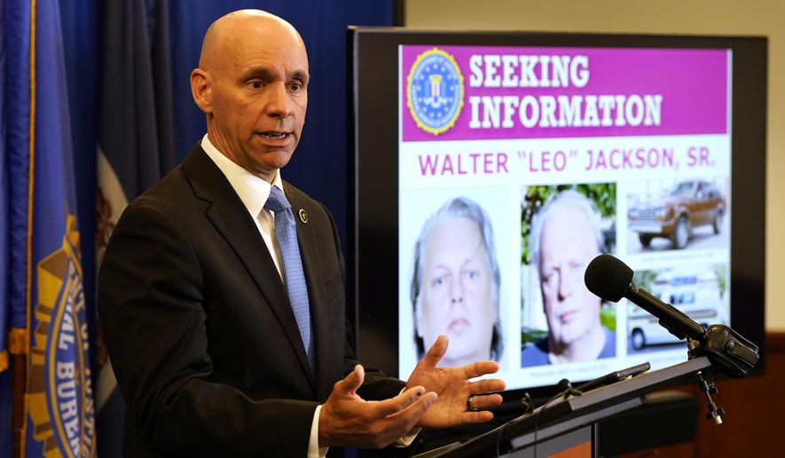 Stanley Meador, Special Agent in Charge of the FBI Richmond Field Office, gestures during a news conference concerning the 1996 murders of Laura "Lollie" Winans and Julianne "Julie" Williams at a campsite in the Shenandoah national park, Thursday, June 20, 2024, in Richmond, Va. (AP Photo/Steve Helber)